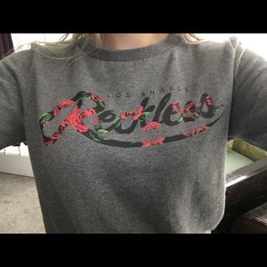 Young and reckless pullover